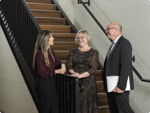 Three lawyers Discussing